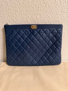Authentic Chanel Caviar leather Clutch